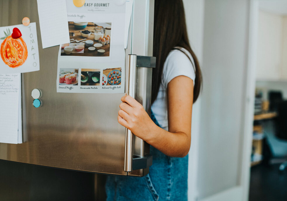 girl-picking-something-eat-out-fridge
